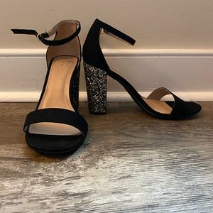 Sparky and black heels